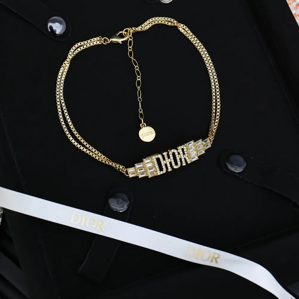 Dior’s heavy-duty step-cut diamond letter necklace is stunning
