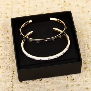 Chanel black and white embossed letter bracelet