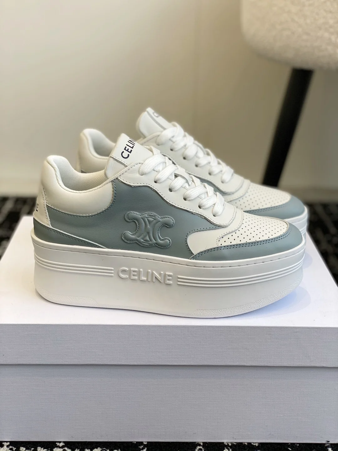 Celine thick-soled white shoes with CELINE logo embossed on the back and sides