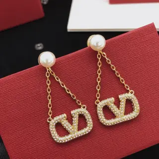 Valentino earrings with tassels and diamonds