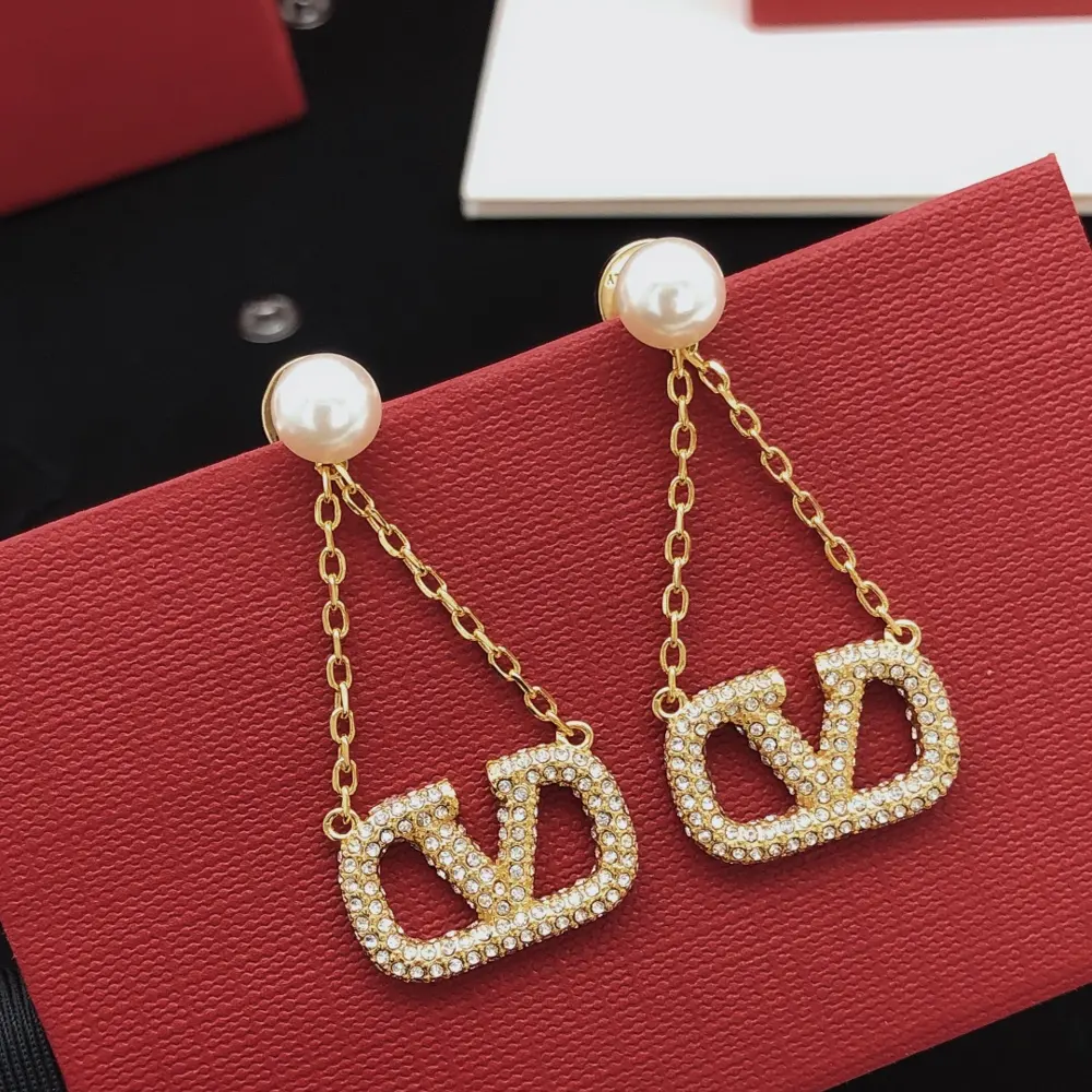Valentino earrings with tassels and diamonds