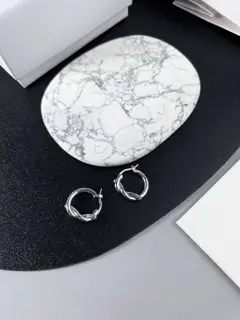 celine knotted earrings