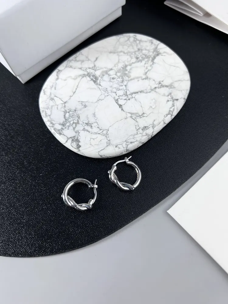 celine knotted earrings