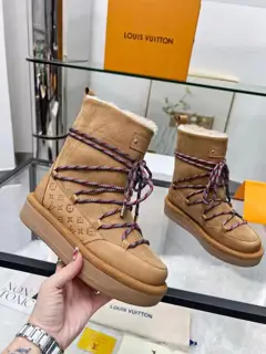 Louis Vuitton furry snow boots are on sale