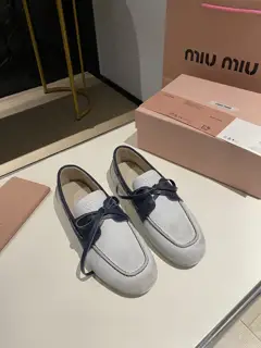 Miu Miu Miu laced eyelet flat shoes