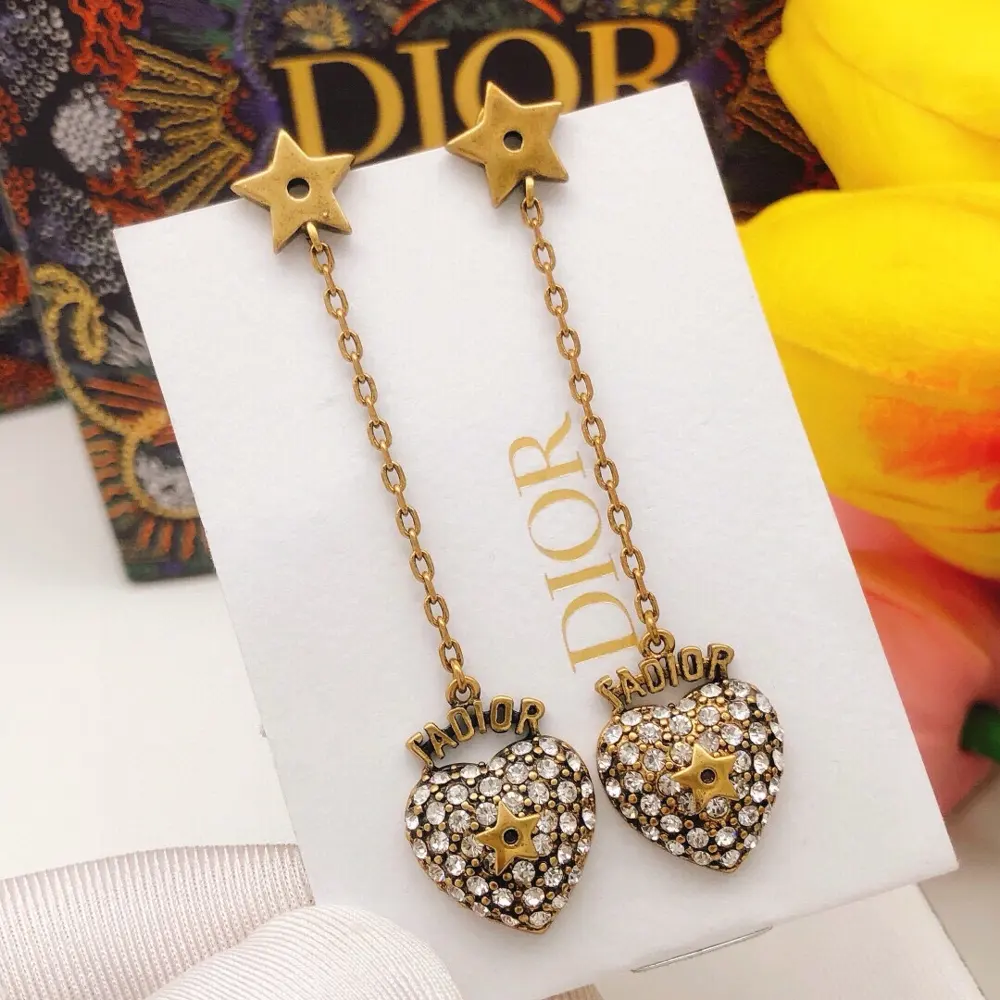 DIOR Hot sale Decorated with love symbol Tassel heart pink Peach heart earrings The same