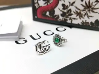 Gucci AB double G emerald flower earrings
