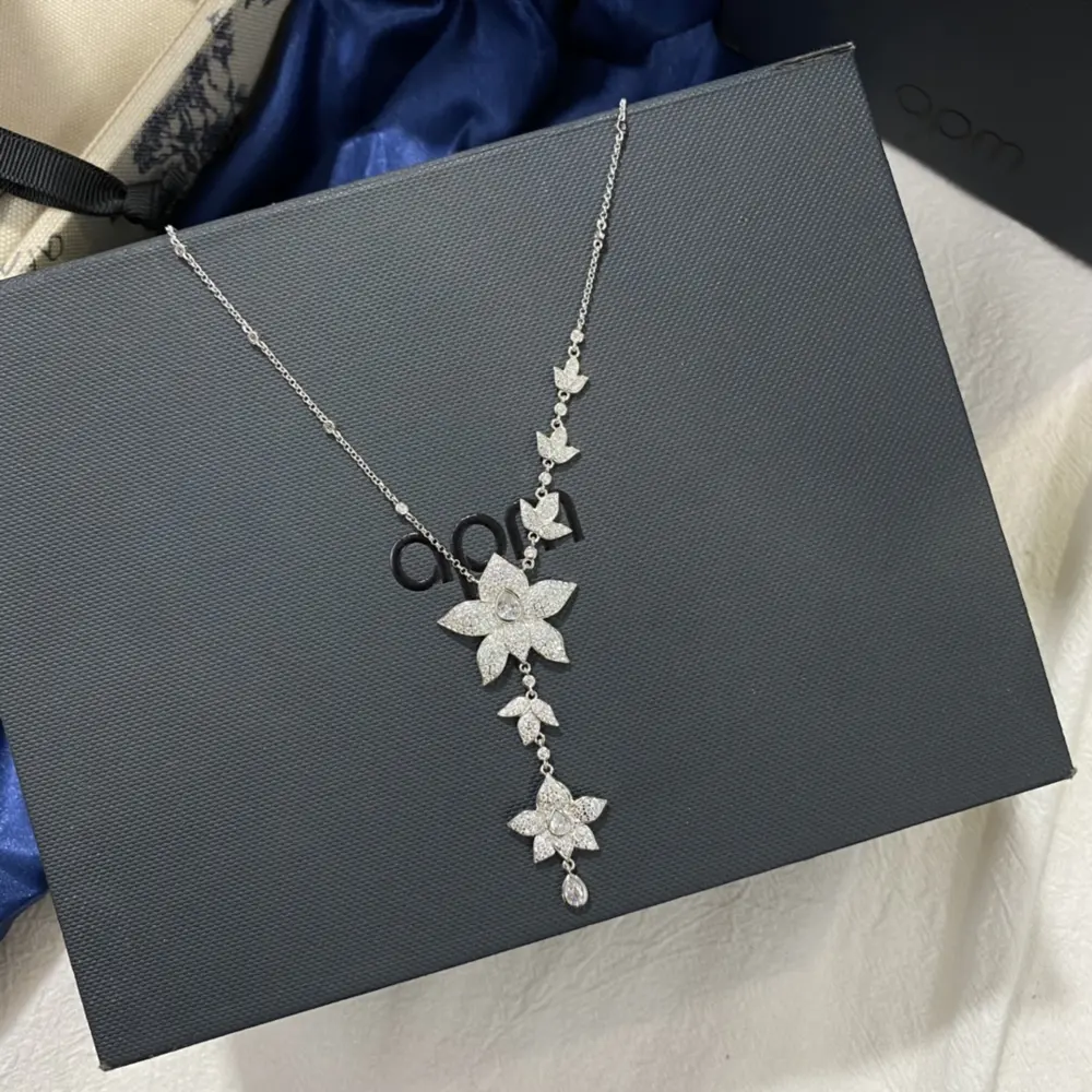 Apm monaco long flower silver necklace women’s sweater chain autumn and winter new year