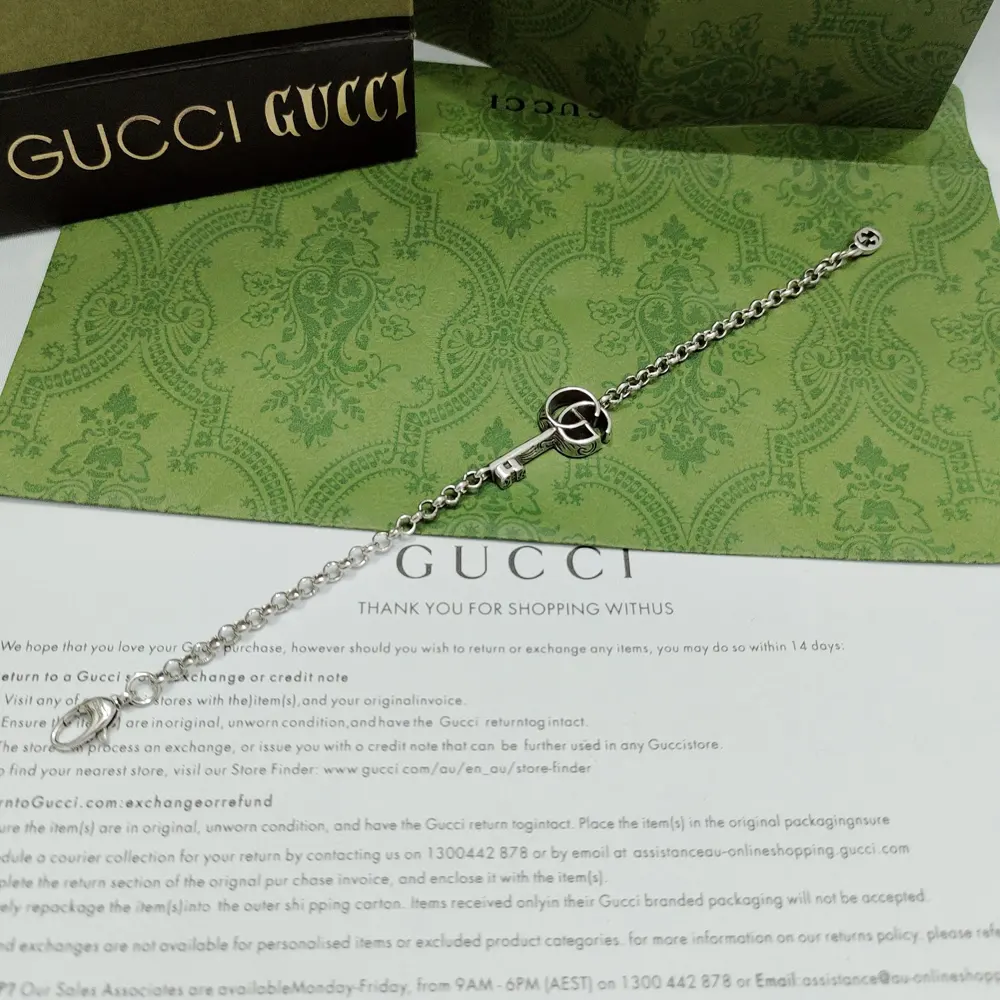 This GUcci bracelet has a distressed effect and cleverly incorporates a chic key design