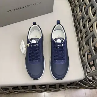 Brunello Cucinelli color-blocked sports flats for men. This pair of flat sports shoes