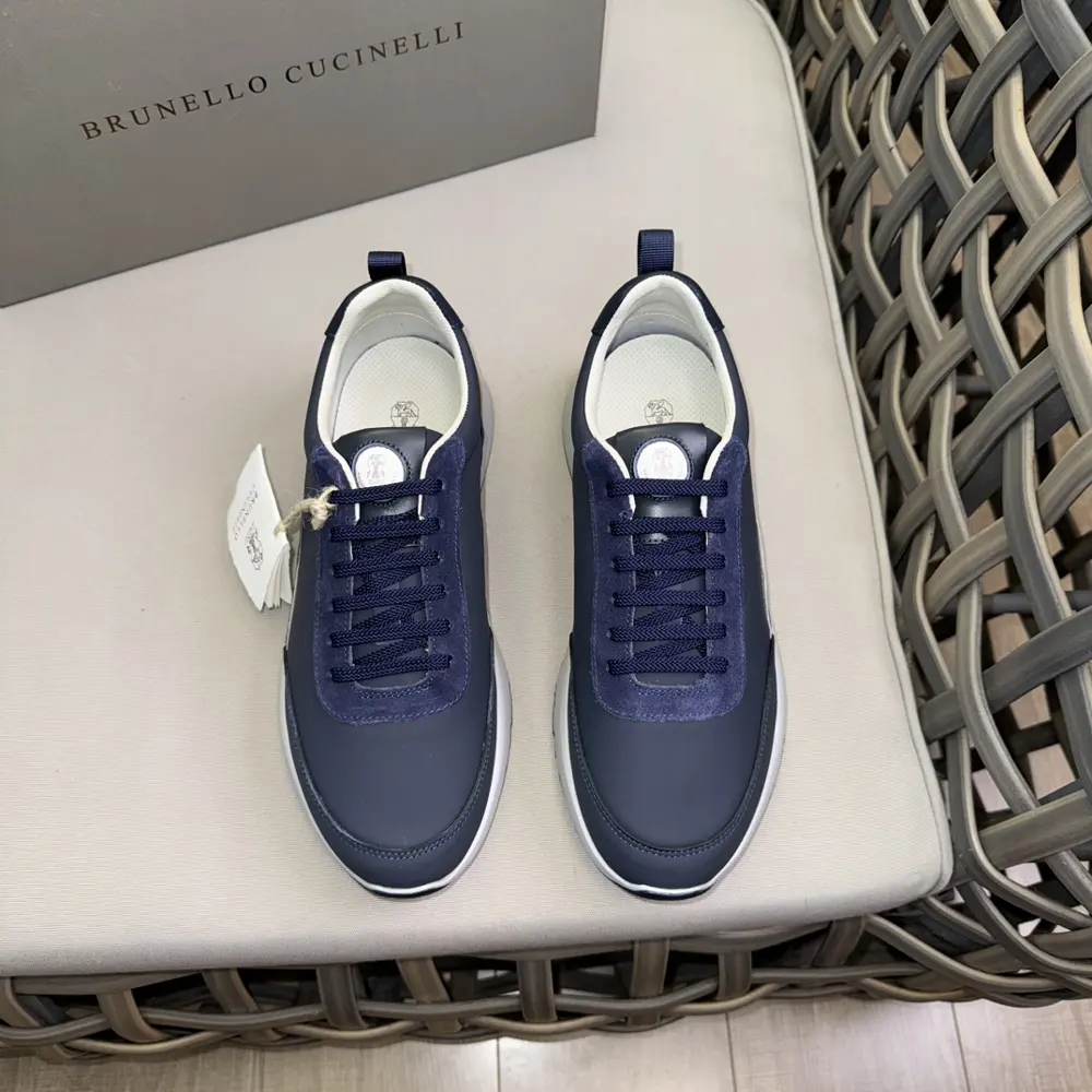 Brunello Cucinelli color-blocked sports flats for men. This pair of flat sports shoes