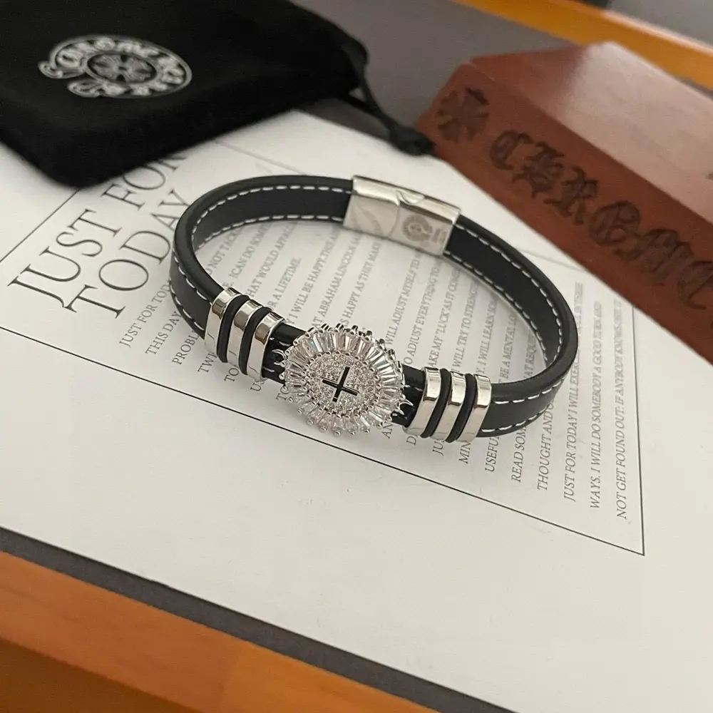 Chrome Hearts cross bracelet with diamonds and leather cord