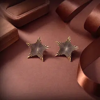 Yves Saint Laurent five-pointed star earrings