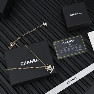 Chanel 24K bow necklace