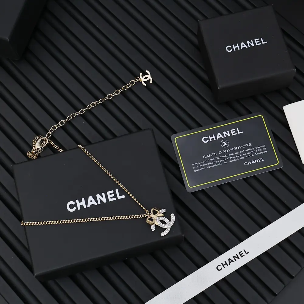 Chanel 24K bow necklace