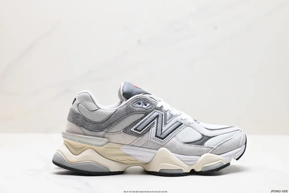 The New Balance 9060 shoe is inspired by the designer’s nostalgic memories of summer. The U9060GRY