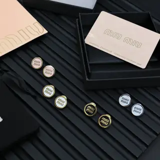 miumiu enamel button earrings