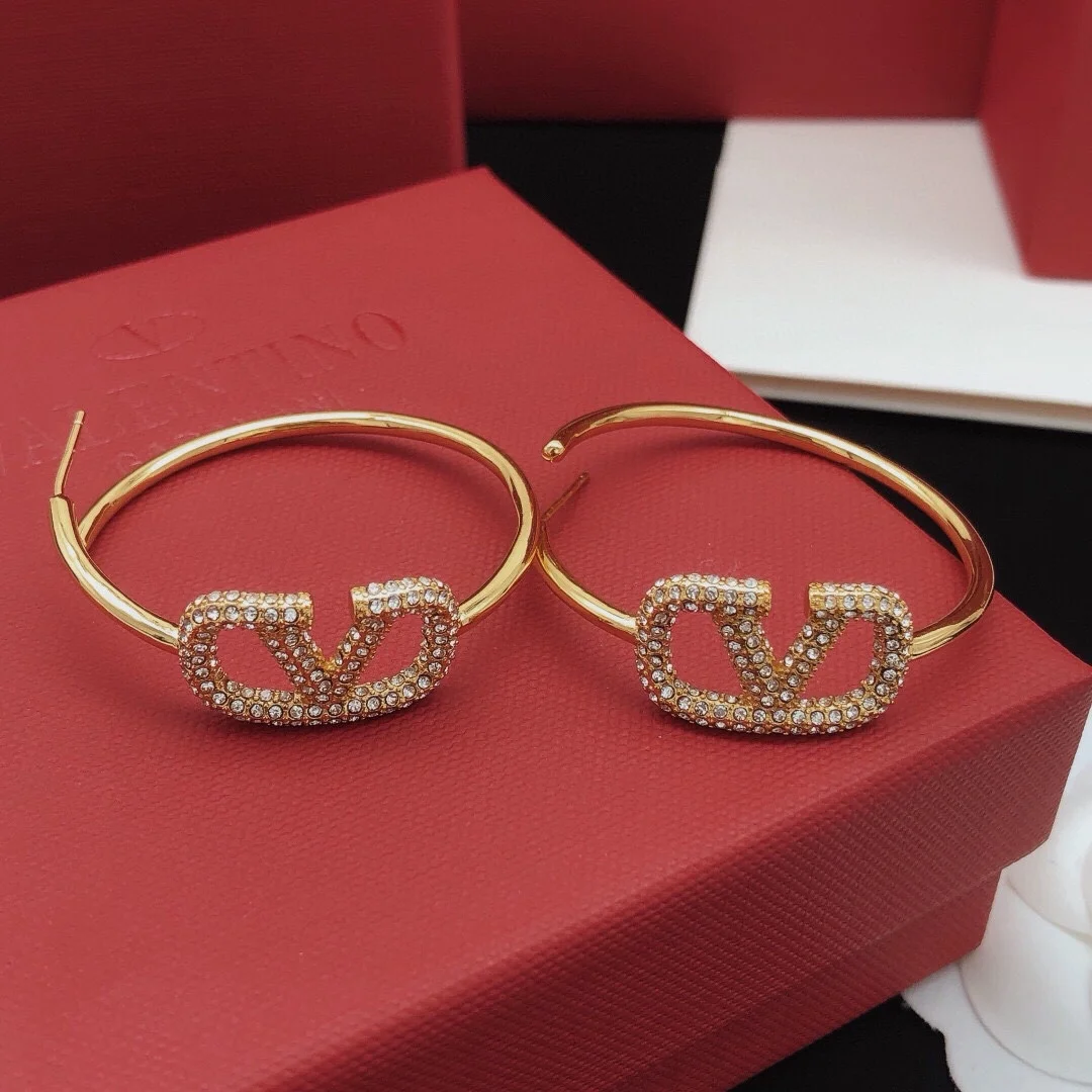 Valentino round moon earrings with diamonds