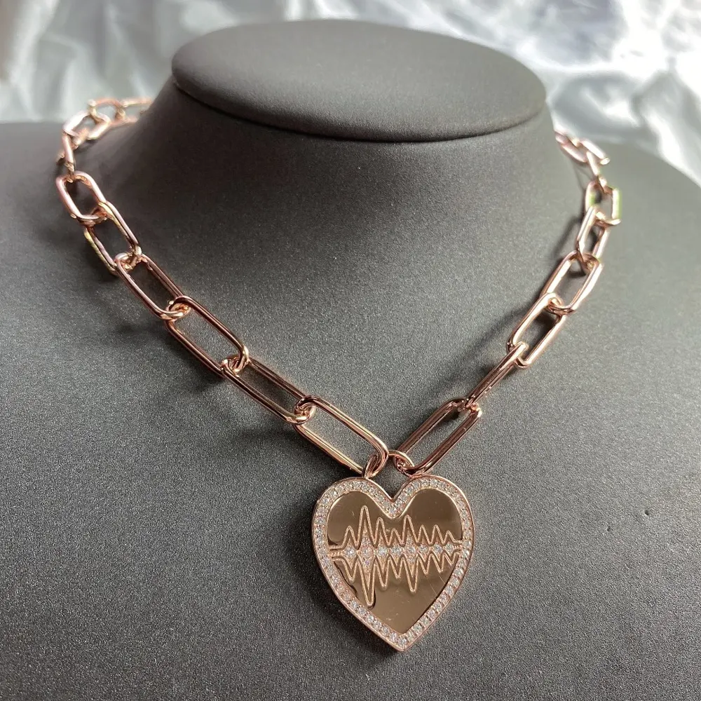 Apm monaco pink and gold beating heart necklace for couples