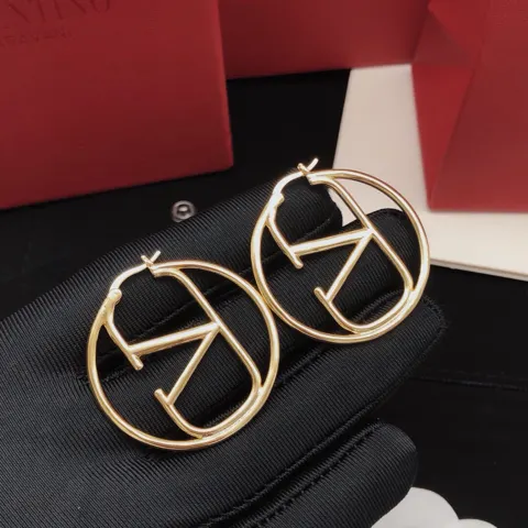 Valentino round glossy earrings