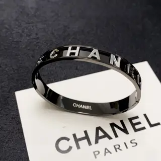 Chanel narrow engraved lettering charcoal black bracelet