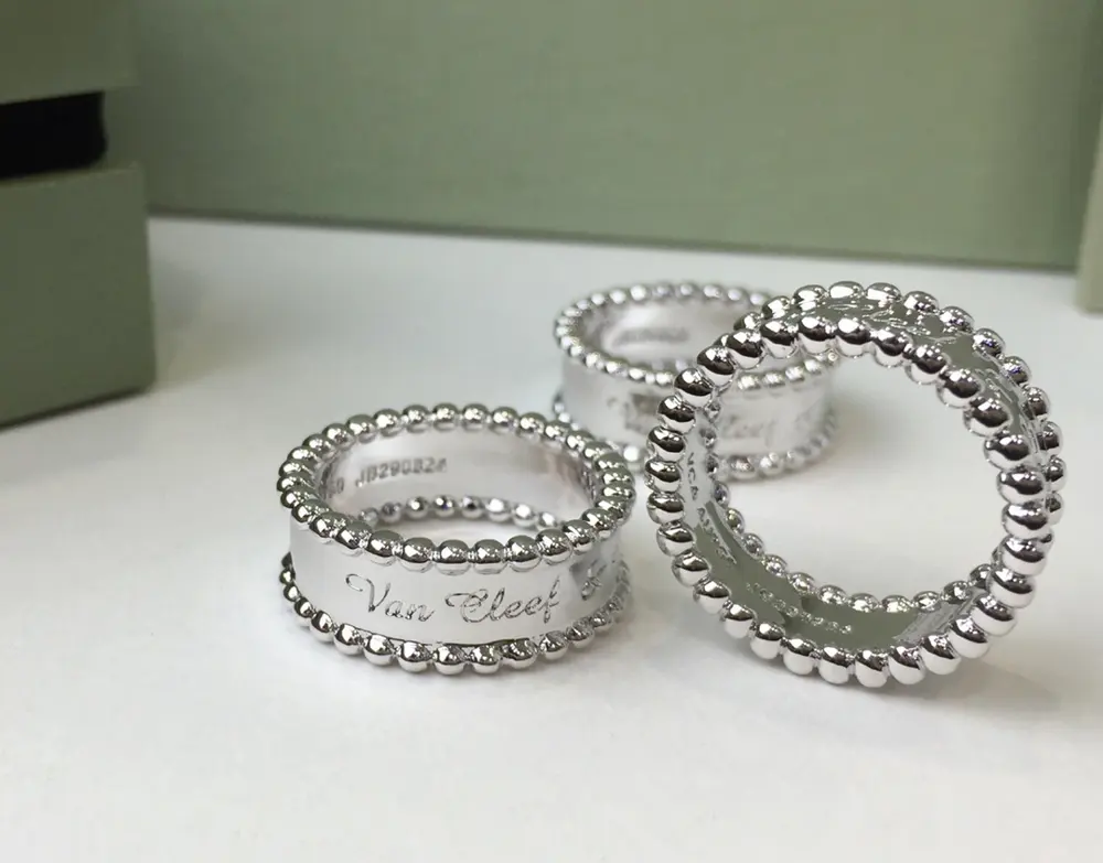 Van Cleef & Arpels beaded logo ring