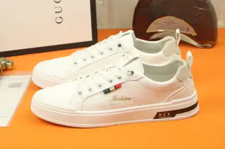 Gucci casual sneakers are featured on the cover of Italian men’s fashion magazines