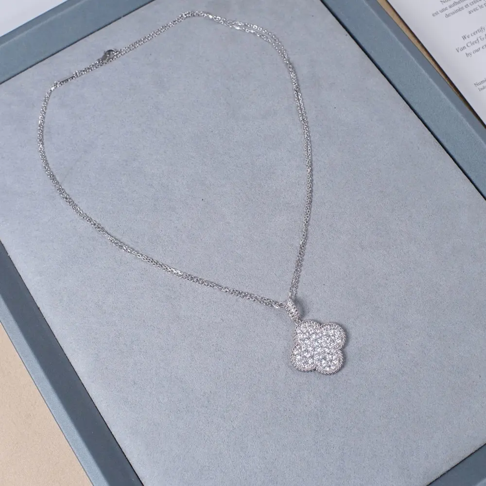 Van Cleef & Arpels diamond-filled four-leaf clover long necklace