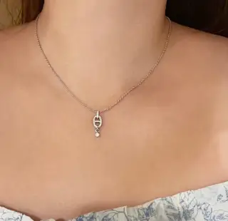 V-gold Hermès diamond-studded pig nose necklace