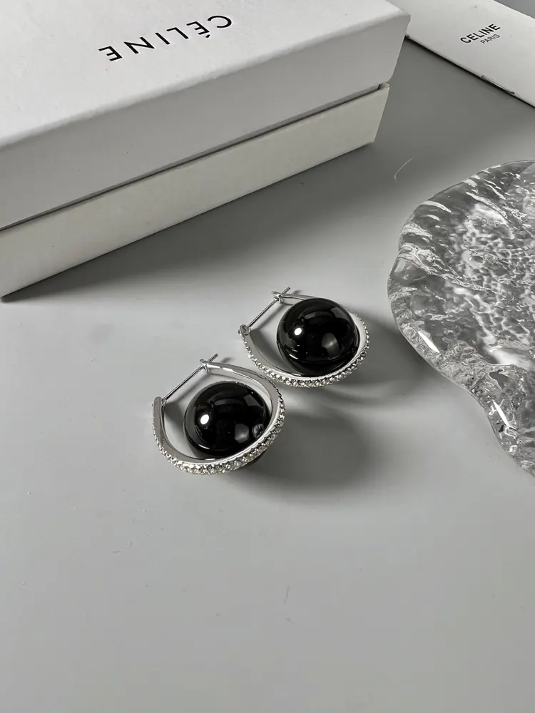 celine silver earrings with black beads