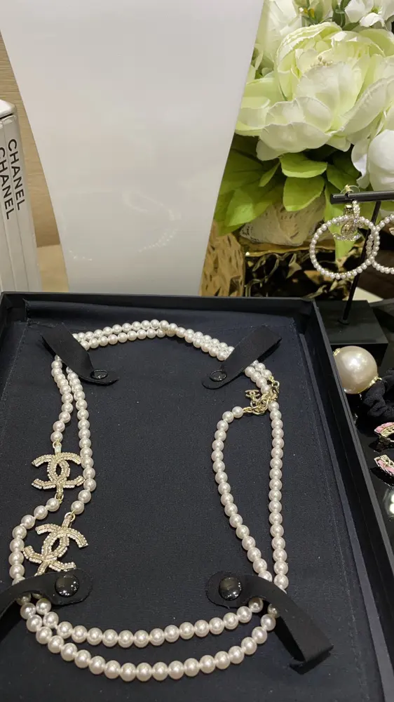 Chanel pearl sweater chain