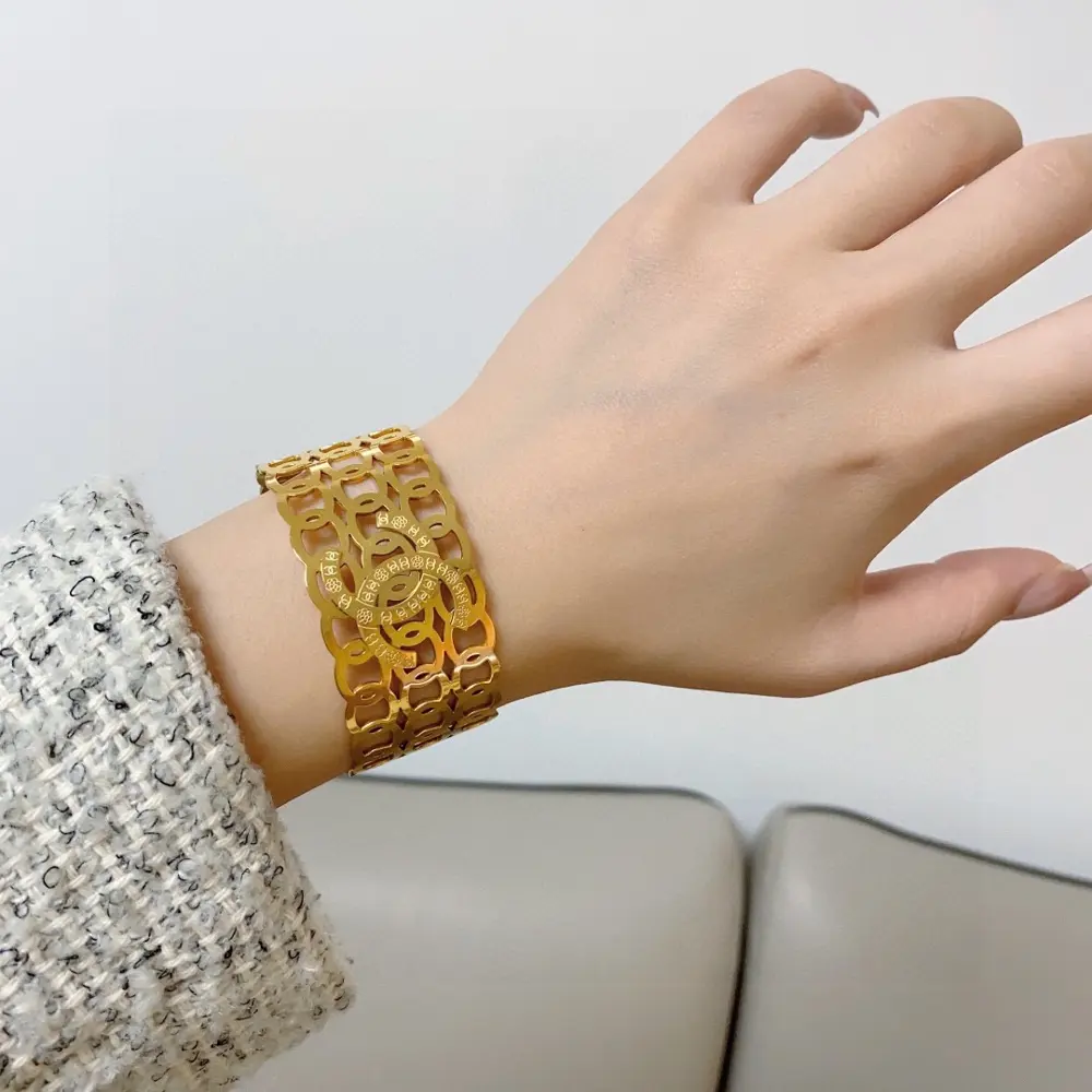 Chanel Double C wide openwork braided bracelet