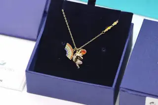 Swarovski Fantasy Unicorn Rainbow Clavicle Necklace combines gold metal
