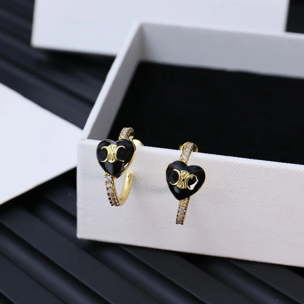 Celine Arc de Triomphe new heart earrings