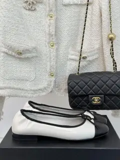Chanel’s timeless classic color-blocked bow ballet shoes