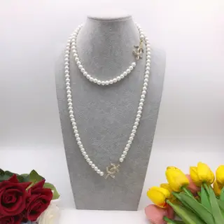 Chanel pearl sweater chain