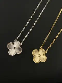 Van Cleef & Arpels laser engraved single flower necklace