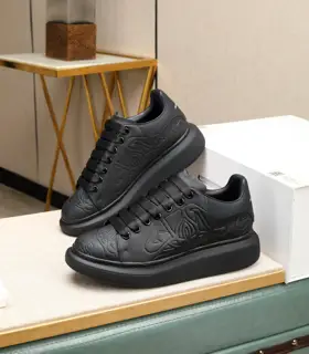 McQueen couple’s white shoes