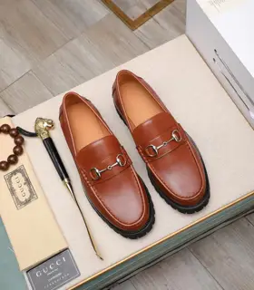 Gucci metal buckle loafers