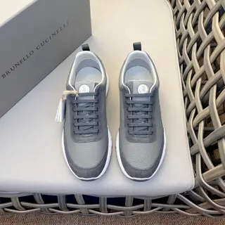 Brunello Cucinelli color-blocked sports flats for men. This pair of flat sports shoes