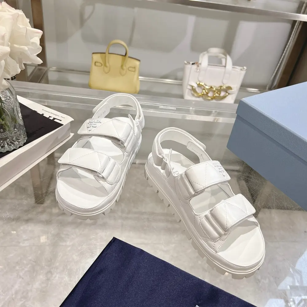 Prada sheepskin sandals combine sporty elements to create a unique fashion statement