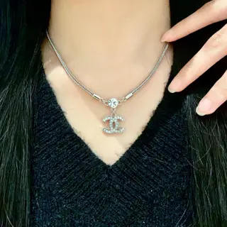 Chanel vintage letter necklace Chanel’s styles really need no introduction Each one is