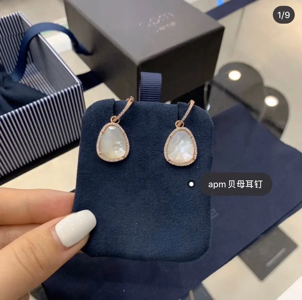 Apm monaco rose gold and white mother-of-pearl earrings