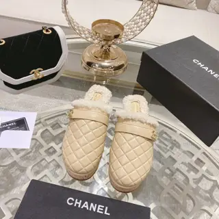 Chanel’s popular all-leather slippers