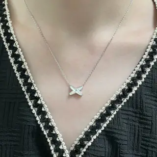 Chaumet cross-over white shell necklace