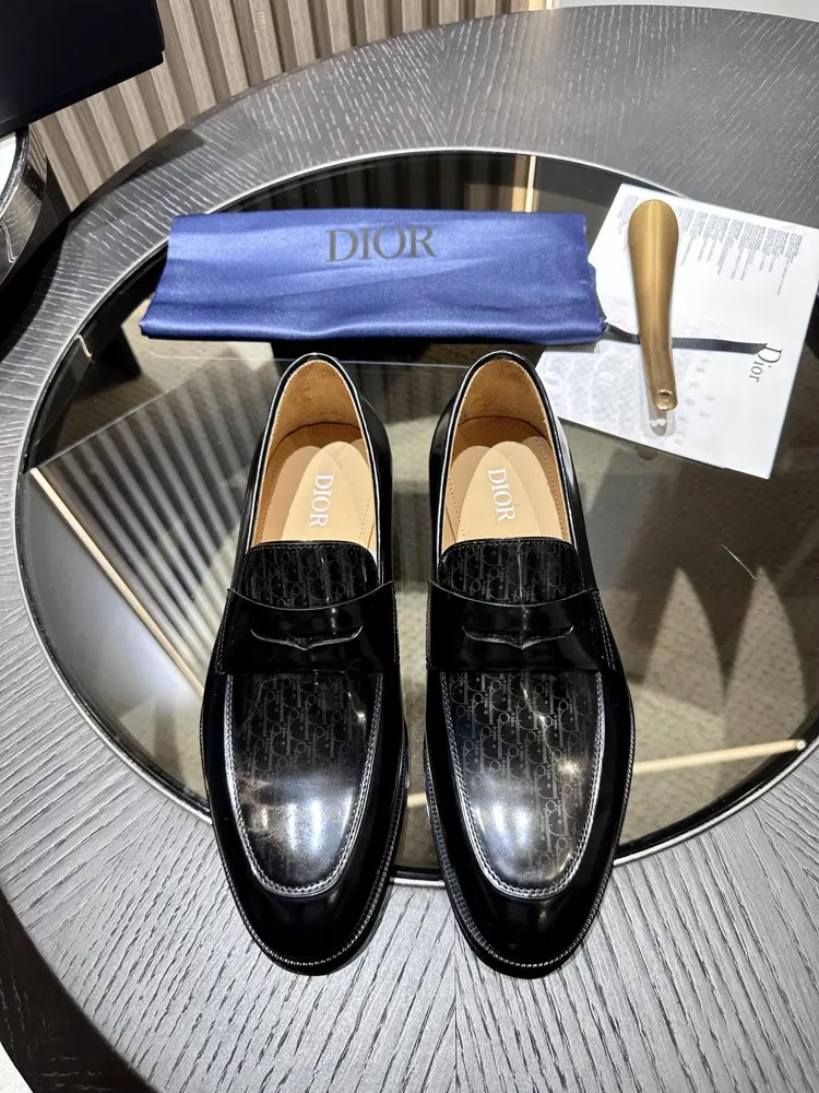The Dior Granville loafer is a modern take on the dress shoe. Crafted in beige and black