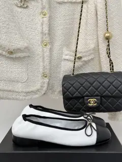 Chanel’s timeless classic color-blocked bow ballet shoes
