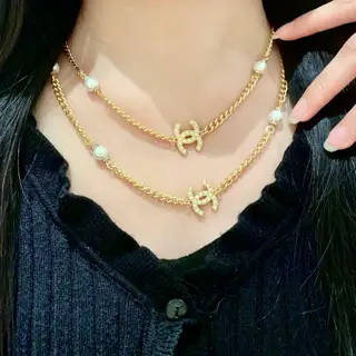 Chanel vintage letter necklace Chanel’s styles really need no introduction Each one is