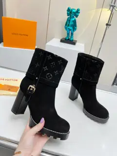 Louis Vuitton is simple but not simplistic Boots