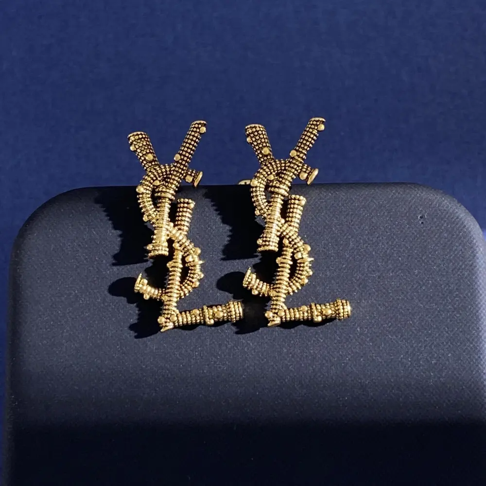 Yves Saint Laurent letter earrings